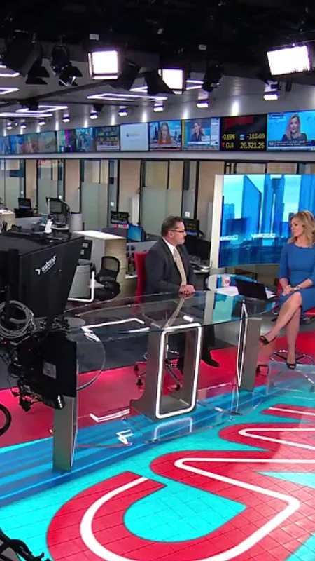 CNN Newsroom broadcast studio with its anchor desk and cameras
