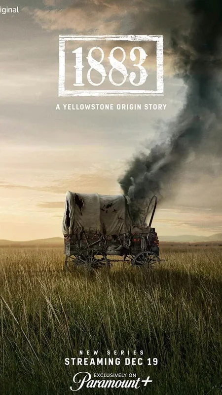 A covered wagon in a golden prairie in the 1883 promotional poster